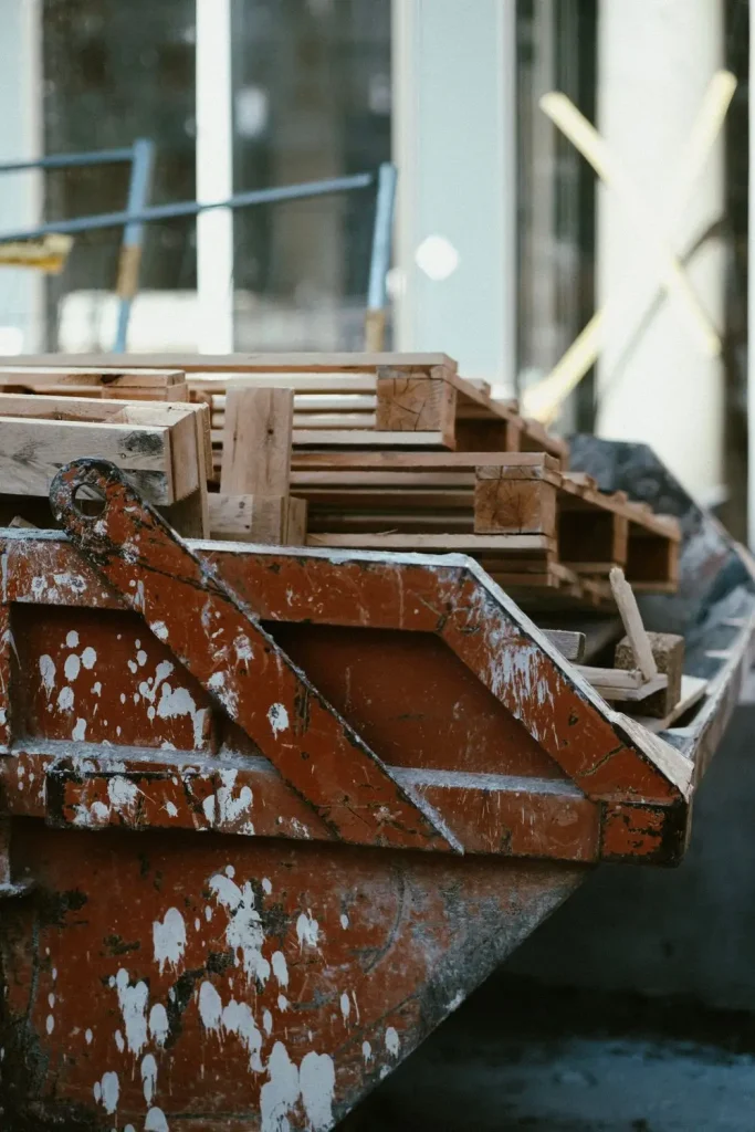 Dumpster loaded with wood debris ready for hauling