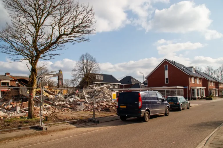 Older home being demolished in a residential neighborhood